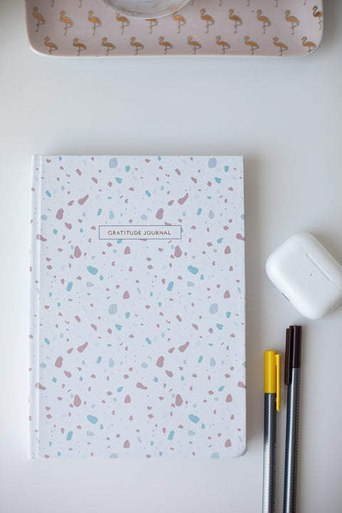 Cover of a Gratitude Journal featuring a beautifully designed cover with elegant illustrations