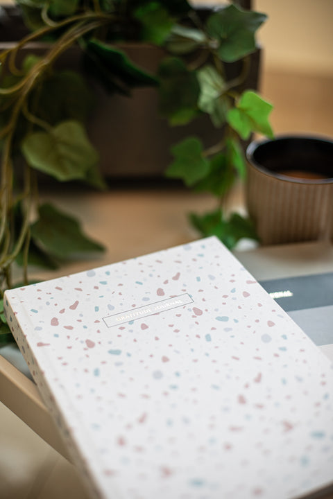 Cover of a Gratitude Journal featuring a beautifully designed cover with elegant illustrations